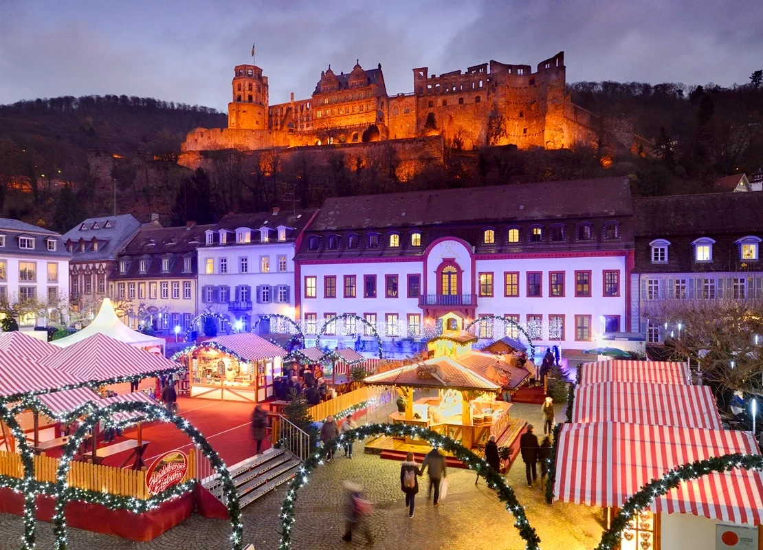 Heidelberg, The castle overlooks the Christmas market on Karlsplatz