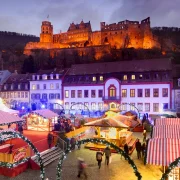 Heidelberg, The castle overlooks the Christmas market on Karlsplatz